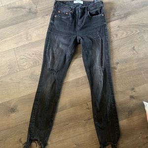 Black jeans with tattered bottoms, great shape